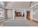 Spacious living room with hardwood floors and a view of the kitchen at 4450 W 300 N, Fairland, IN 46126