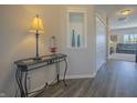 Inviting entryway featuring modern decor, wood floors, and a glimpse into the comfortable living space at 1001 Parker Ln, Westfield, IN 46074