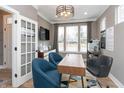 Bright office space with wood floors, neutral walls, and an abundance of light at 1837 Luther St, Indianapolis, IN 46203