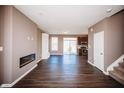 Bright living room with sleek fireplace, hardwood floors, and an open floor plan with lots of natural light at 1902 Zwingley St, Indianapolis, IN 46203