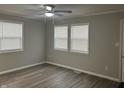 Living room with hardwood floors and neutral walls at 3357 N Drexel Ave, Indianapolis, IN 46218