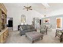 Spacious living room with vaulted ceiling and ample natural light at 8176 Foxchase Cir, Indianapolis, IN 46256