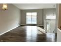 Spacious living room with hardwood floors and large windows at 9518 Bay Vista E Dr, Indianapolis, IN 46250