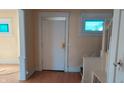 Front entry with hardwood floors and staircase at 1052 N Mount St, Indianapolis, IN 46222