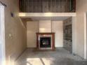 Spacious living room featuring a fireplace and built-in shelving at 208 Winding Dr, Alexandria, IN 46001