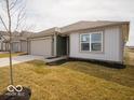 A single-story home with a well-maintained lawn and inviting curb appeal at 3231 W Keepsake Ln, Monrovia, IN 46157