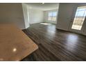 Bright and airy living room with hardwood floors and direct access to the backyard through a glass door at 3231 W Keepsake Ln, Monrovia, IN 46157