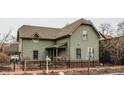 Charming two-story home boasts a classic design, complete with a well-maintained yard and inviting facade at 634 E Vermont St, Indianapolis, IN 46202
