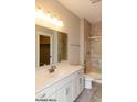 Elegant bathroom with a walk-in shower, tiled flooring, and white vanity at 1578 Palmetto Way, Greenfield, IN 46140