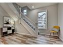 Stylish entryway, hardwood floors and a grand staircase at 2450 Carrollton Ave, Indianapolis, IN 46205