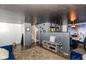 Open living room with a half wall separating it from the dining area at 8224 Barry Rd, Indianapolis, IN 46219