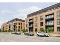 Modern apartment building with ample parking at 855 N East St # 101, Indianapolis, IN 46202