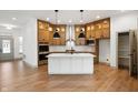 Modern kitchen with a large island, stainless steel appliances, and ample cabinetry at 20035 Meadow Neck Rd, Westfield, IN 46074