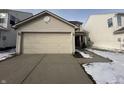 Charming two-story home with attached two-car garage and concrete driveway at 2734 Mingo Ct, Indianapolis, IN 46217