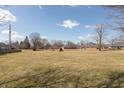Expansive backyard offers lots of open green space and views of the surrounding neighborhood at 306 Vinewood N Dr, Brownsburg, IN 46112