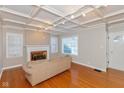 Living room with hardwood floors and a fireplace at 31 N Kenmore Rd, Indianapolis, IN 46219