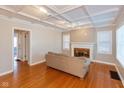 Living room with hardwood floors and a fireplace at 31 N Kenmore Rd, Indianapolis, IN 46219
