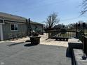 Large wooden deck with seating area, fire pit, and gazebo at 3480 S Us Highway 31, Franklin, IN 46131