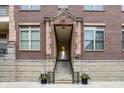Main entrance with steps leading to the building at 450 E Ohio St # 106, Indianapolis, IN 46204