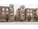 Attractive brick building with multiple units and gated entrance at 450 E Ohio St # 106, Indianapolis, IN 46204