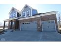 Beautiful two-story home with brick and siding, featuring a spacious two-car garage at 5511 Sienna Ct, Brownsburg, IN 46112