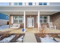 Inviting front porch with rocking chairs and a porch swing at 6250 Bales Dr, Plainfield, IN 46168