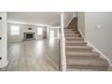 Spacious entryway with staircase and view of living area at 6250 Bales Dr, Plainfield, IN 46168