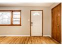 Living room with hardwood floors and neutral walls at 8415 E 10Th St, Indianapolis, IN 46219