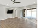 Finished basement with sliding glass doors leading to a patio at 201 S Mckinley St, North Salem, IN 46165