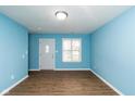 Light blue living room with wood floors at 1130 W 33Rd St, Indianapolis, IN 46208