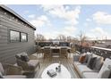 Rooftop deck with city views, seating, and dining area at 1234 Alabama St, Indianapolis, IN 46202