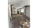 Under renovation, this room has exposed walls and floors at 239 Iowa St, Indianapolis, IN 46225