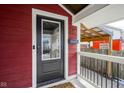 Black front door with glass panels and white trim at 745 Laurel St, Indianapolis, IN 46203