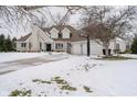 Two story house with attached garage and basketball hoop in the front yard at 10295 Summerlin Way, Fishers, IN 46037