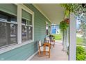 Relaxing side porch with seating, perfect for enjoying the outdoors at 2015 Columbia Ave, Indianapolis, IN 46202