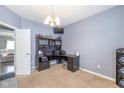 Home office with built-in corner desk and ample storage at 4046 Stubbington Ln, Indianapolis, IN 46239
