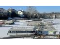 Boat slips on a frozen lake in a residential community at 8207 Shorewalk Dr, Indianapolis, IN 46236
