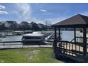 Community gazebo overlooks the boat dock and the waterway for relaxation and enjoyment at 8207 Shorewalk Dr, Indianapolis, IN 46236