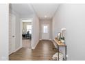 Bright entryway with hardwood floors and access to an office at 8576 Jeff Cir, Brownsburg, IN 46112