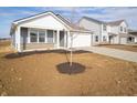 Inviting single-Gathering house with a manicured lawn, neutral color palette, and attached garage at 1208 Fleming Dr, Greenfield, IN 46140