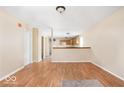 Bright living room featuring hardwood-style floors and neutral paint at 3614 E New York St, Indianapolis, IN 46201