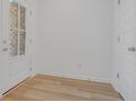 Bright entryway with light hardwood floors and white walls at 5755 Cr W 750 N, McCordsville, IN 46055