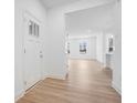 Spacious entryway with hardwood floors and view to living room at 5767 Cr W 750 N, McCordsville, IN 46055
