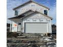 Two-story house with white vinyl siding and attached garage at 1440 Wigwam Ln, Martinsville, IN 46151