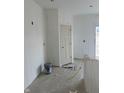 Unfinished kitchen with white walls and corner pantry at 1440 Wigwam Ln, Martinsville, IN 46151