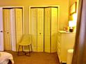 Bedroom with double door closet and dresser at 1842 Queensbridge Dr, Indianapolis, IN 46219