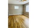 Spacious living room featuring wood-look floors and neutral walls at 3130 Chrysler St, Indianapolis, IN 46224