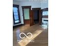 Hardwood floor living room with built-ins at 340 W 11Th St, Anderson, IN 46016