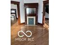 Living room featuring a decorative fireplace at 340 W 11Th St, Anderson, IN 46016