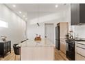 Modern kitchen with granite countertops and stainless steel appliances at 617 Marion Ave, Indianapolis, IN 46221